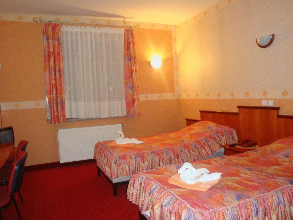 Двухместный (Двухместный номер с 1 кроватью или 2 отдельными кроватями) отеля Bonaparte, Ченстохова