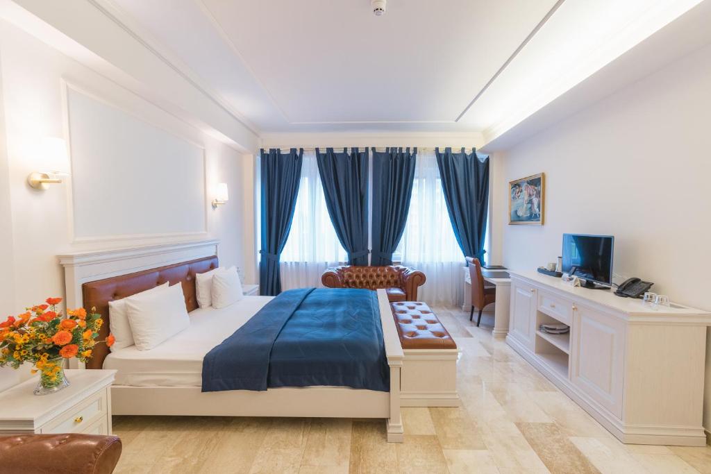 Двухместный (Улучшенный двухместный номер с 2 отдельными кроватями) отеля Grand Hotel Palladium, Мюнхен