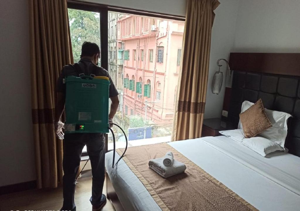 Двухместный (Улучшенный двухместный номер с 1 кроватью или 2 отдельными кроватями) отеля The Corporate, Калькутта