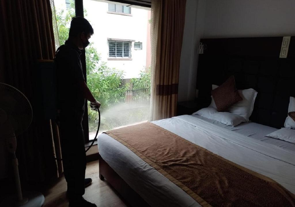Двухместный (Представительский двухместный номер с 1 кроватью или 2 отдельными кроватями) отеля The Corporate, Калькутта