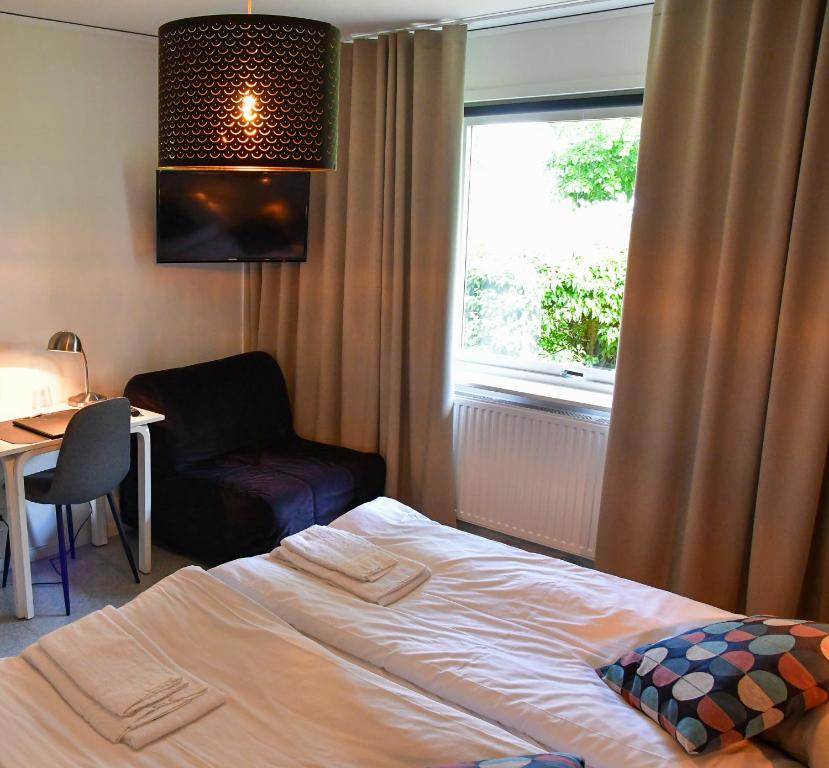 Двухместный (Стандартный двухместный номер с 1 кроватью) отеля Wisingsö Hotell & Konferens, Гренна