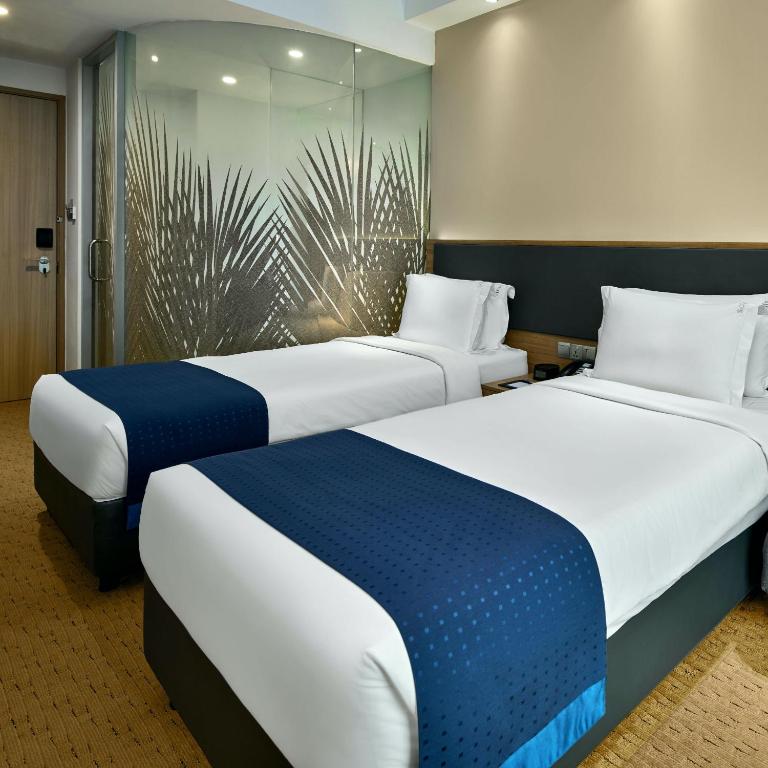 Двухместный (Стандартный двухместный номер с 2 отдельными кроватями) отеля Holiday Inn Express Singapore Orchard Road, Сингапур (город)