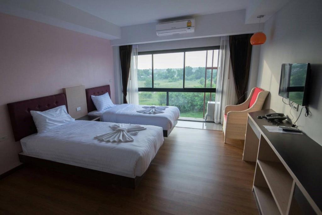 Двухместный (Улучшенный номер с кроватью размера «king-size») отеля Phatra Boutique Hotel, Удонтхани