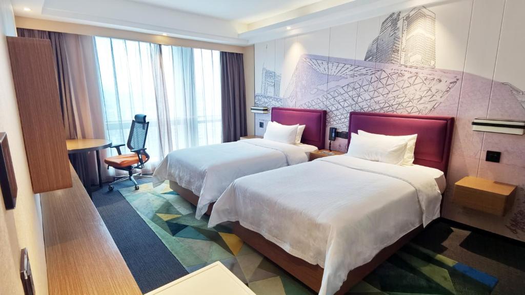 Двухместный (Улучшенный двухместный номер с 2 отдельными кроватями) отеля Hampton by Hilton Guangzhou Zhujiang New Town, Гуанчжоу