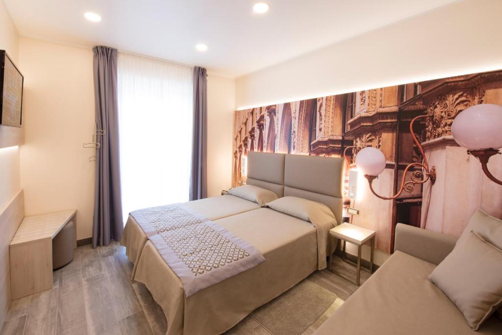 Двухместный (Двухместный номер Делюкс с 1 кроватью или 2 отдельными кроватями) отеля Hotel Sempione, Милан