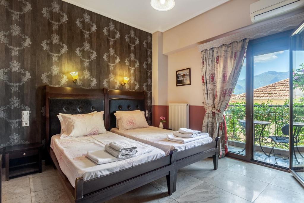 Двухместный (Двухместный номер с 2 отдельными кроватями и видом на горы) гостевого дома Toti Boutique Rooms, Калампака