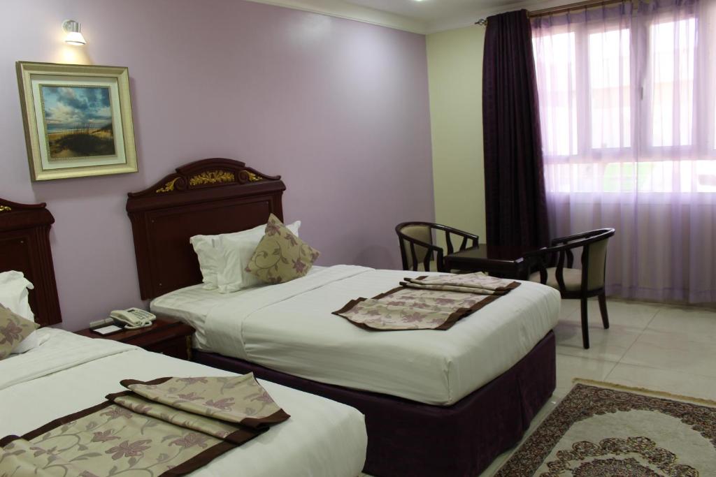 Двухместный (Стандартный двухместный номер с 2 отдельными кроватями) отеля Al Diyar Hotel, Низва