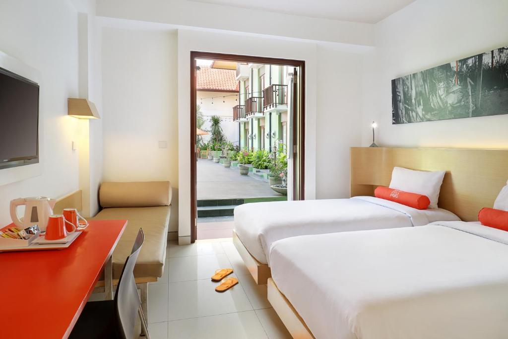 Двухместный (Двухместный номер HARRIS с 1 кроватью или 2 отдельными кроватями - Бесплатный трансфер от/до аэропорта) отеля HARRIS Hotel Tuban Bali, Кута