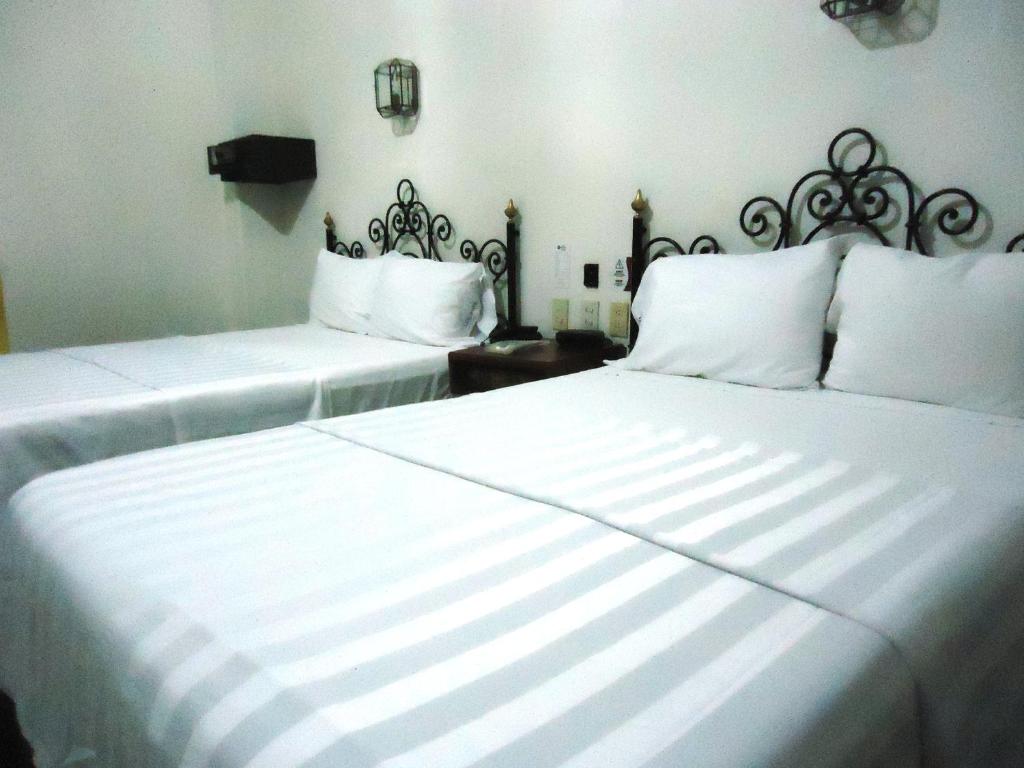 Двухместный (Стандартный двухместный номер с 2 отдельными кроватями) отеля Best Western Plus Hotel Ceballos, Колима
