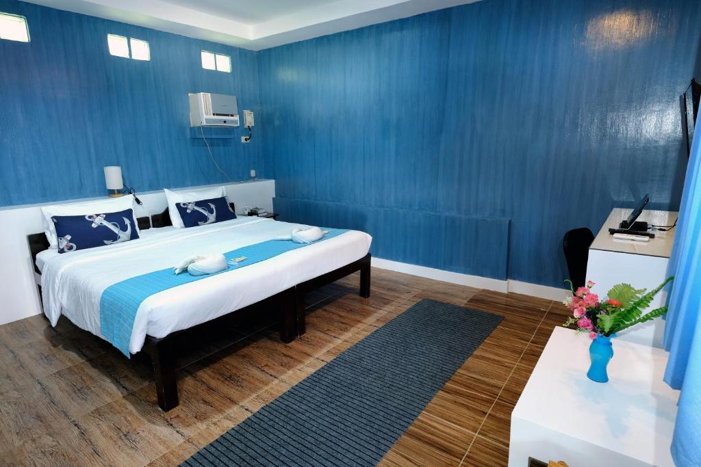 Двухместный (Двухместный номер Делюкс с 1 кроватью или 2 отдельными кроватями) курортного отеля Pescadores Seaview Suites, Моалбоал