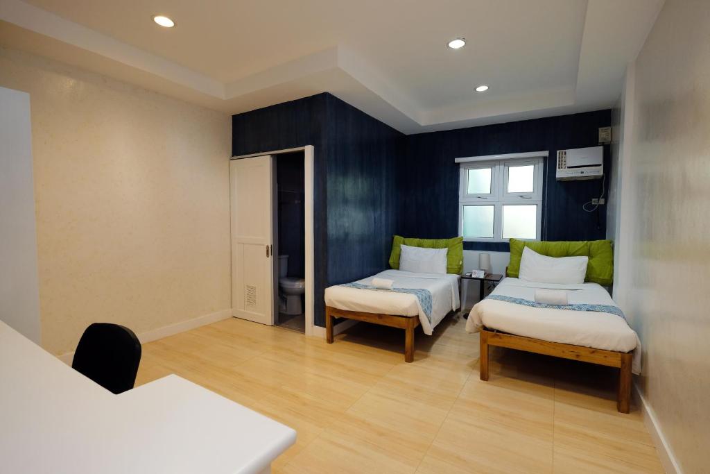 Двухместный (Стандартный двухместный номер с 1 кроватью или 2 отдельными кроватями) курортного отеля Pescadores Seaview Suites, Моалбоал