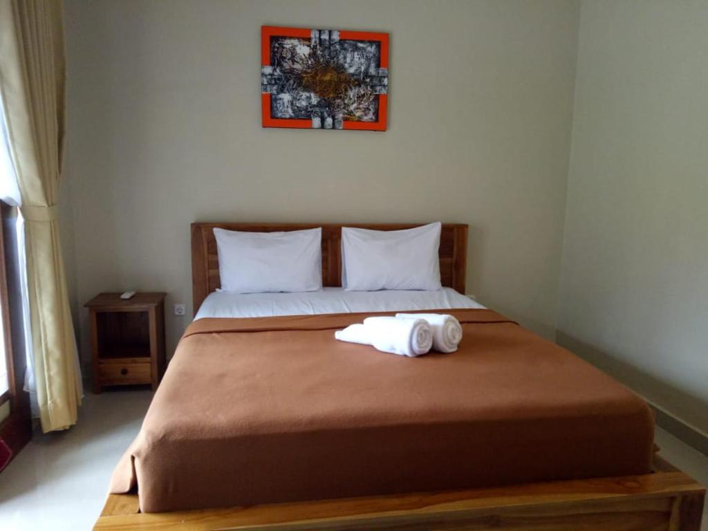 Двухместный (Двухместный номер Делюкс с 1 кроватью) отеля OYO 828 Lilis Cempaka Mas Residence, Чангу