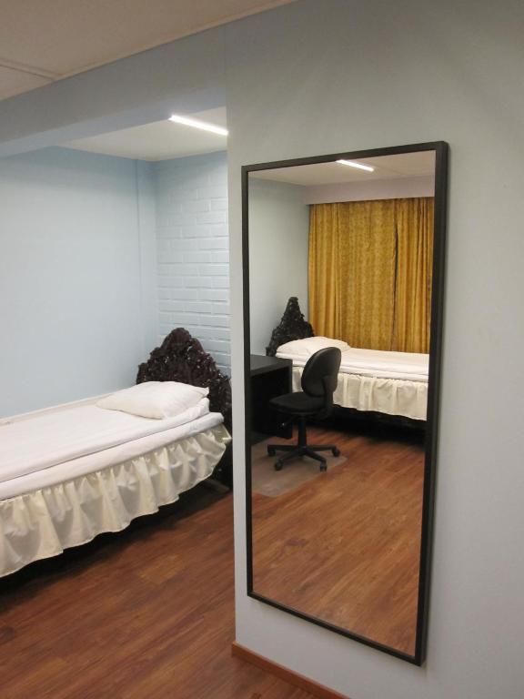 Двухместный (Стандартный двухместный номер с 2 отдельными кроватями и общей ванной комнатой) гостевого дома Finn Rooms, Тампере