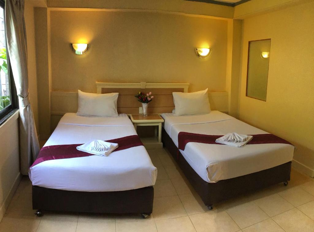 Двухместный (Двухместный номер с 2 отдельными кроватями и собственной ванной комнатой) отеля PatangLegendHotel, Пхукет