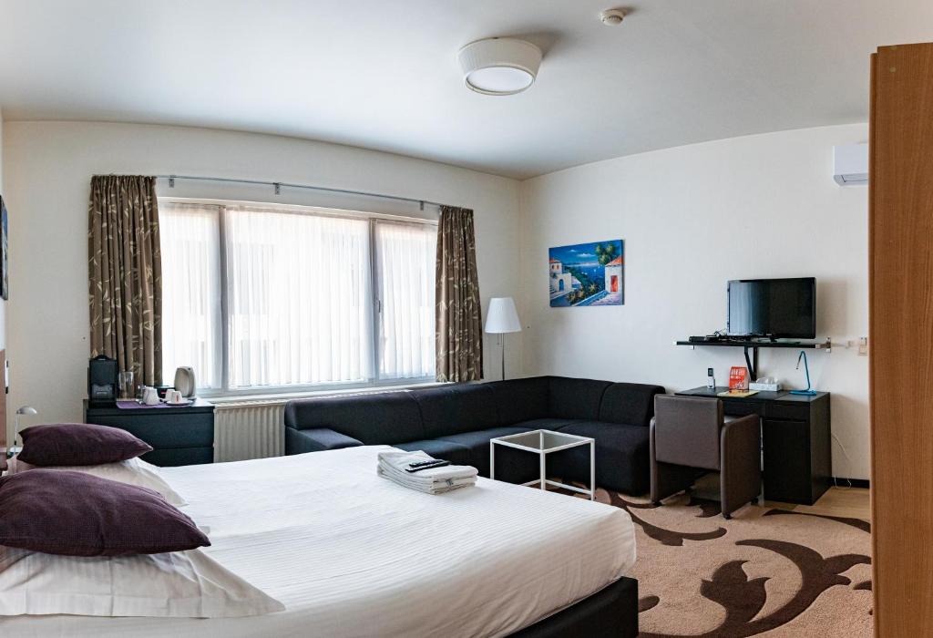 Двухместный (Двухместный номер с 1 кроватью и гостиной зоной) отеля Hotel Cathedral, Гент