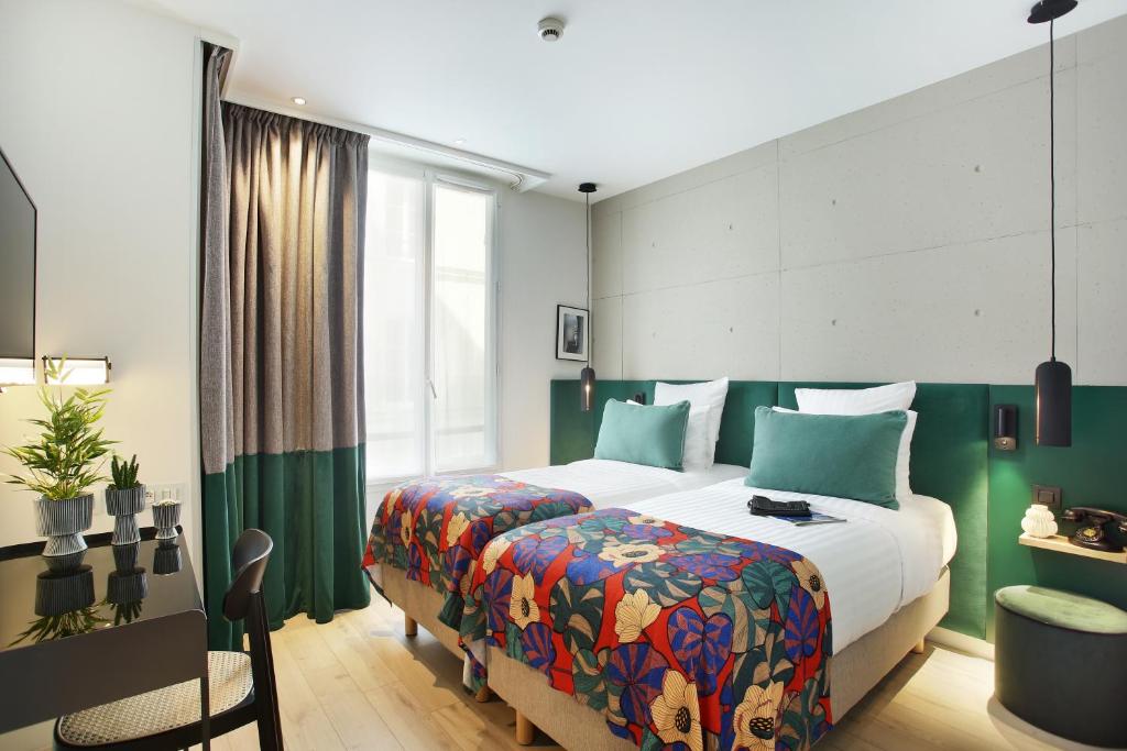 Двухместный (Классический двухместный номер с 2 отдельными кроватями) отеля Hotel Basile, Париж