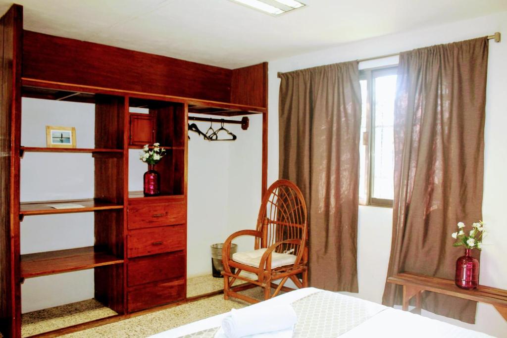 Двухместный (Двухместный номер с 1 кроватью и общей ванной комнатой) хостела Hostal & Suites Pata de Perro, Бакалар