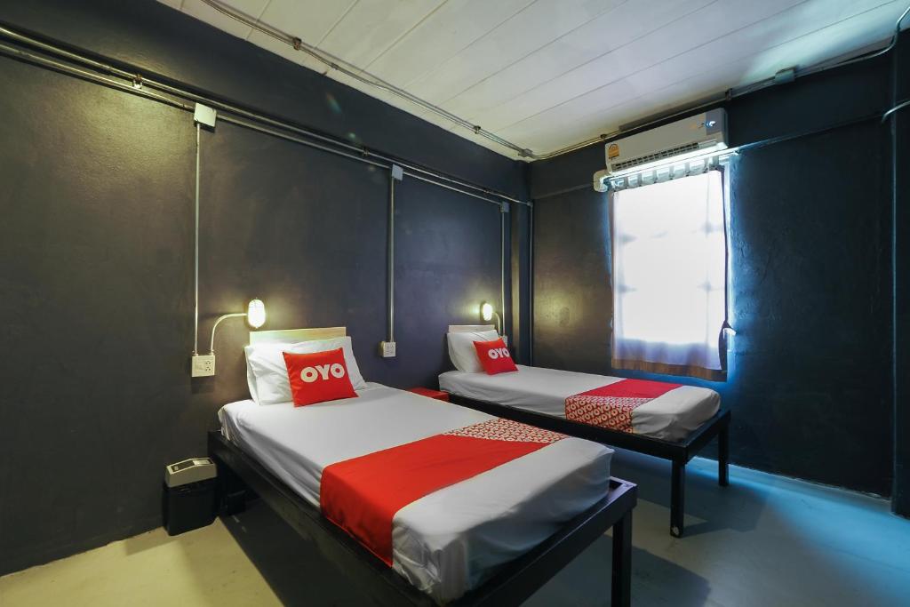 Двухместный (Двухместный номер с 2 отдельными кроватями и общей ванной комнатой) отеля VM1, Бангкок