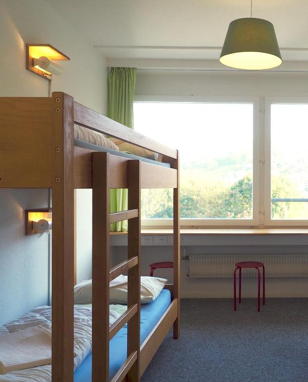 Номер (Односпальная кровать в общем мужском номере) хостела Hostel 77 Bern, Берн