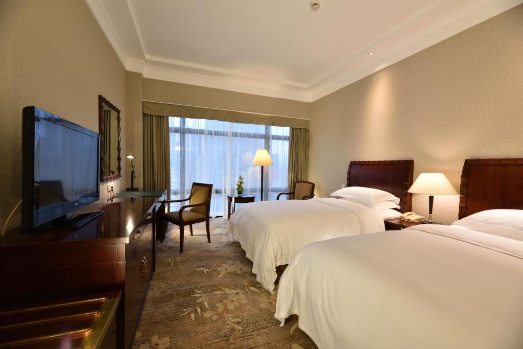 Двухместный (Двухместный номер Делюкс с 2 отдельными кроватями) отеля Hotel Equatorial Shanghai, Шанхай