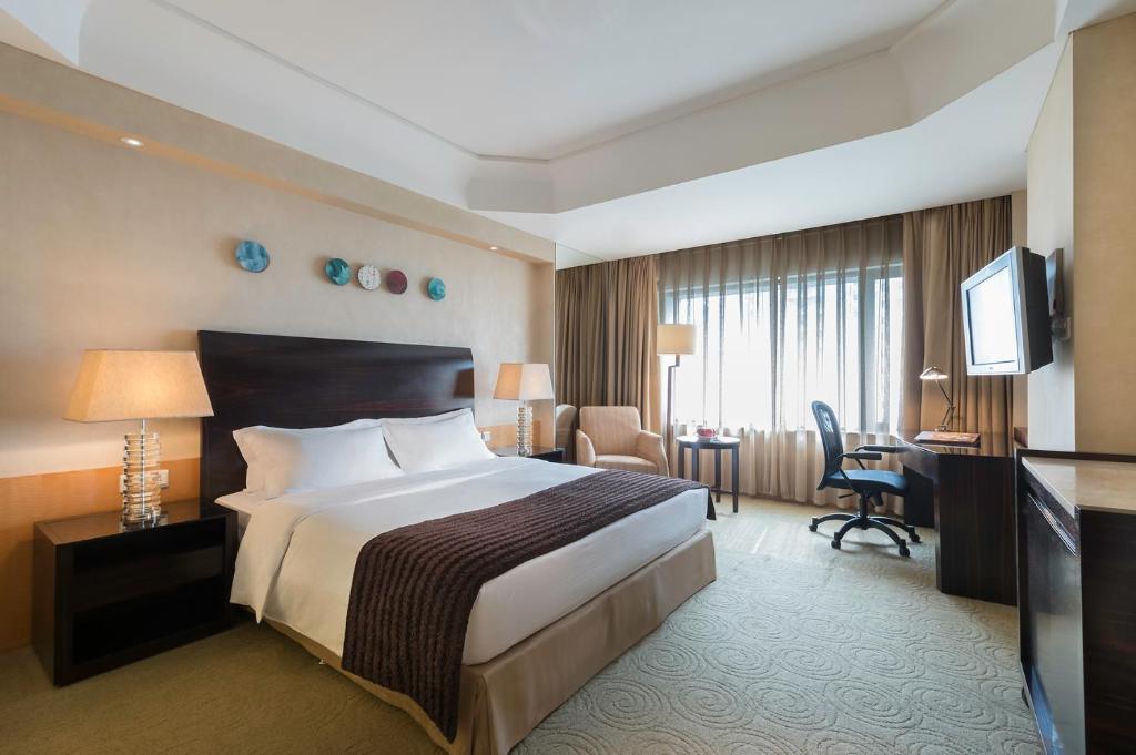 Двухместный (Улучшенный номер с кроватью размера «king-size») отеля Marco Polo Parkside, Beijing, Пекин