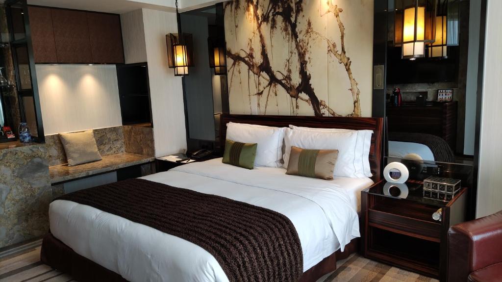 Двухместный (Continental Club Deluxe King Room) отеля Marco Polo Parkside, Beijing, Пекин