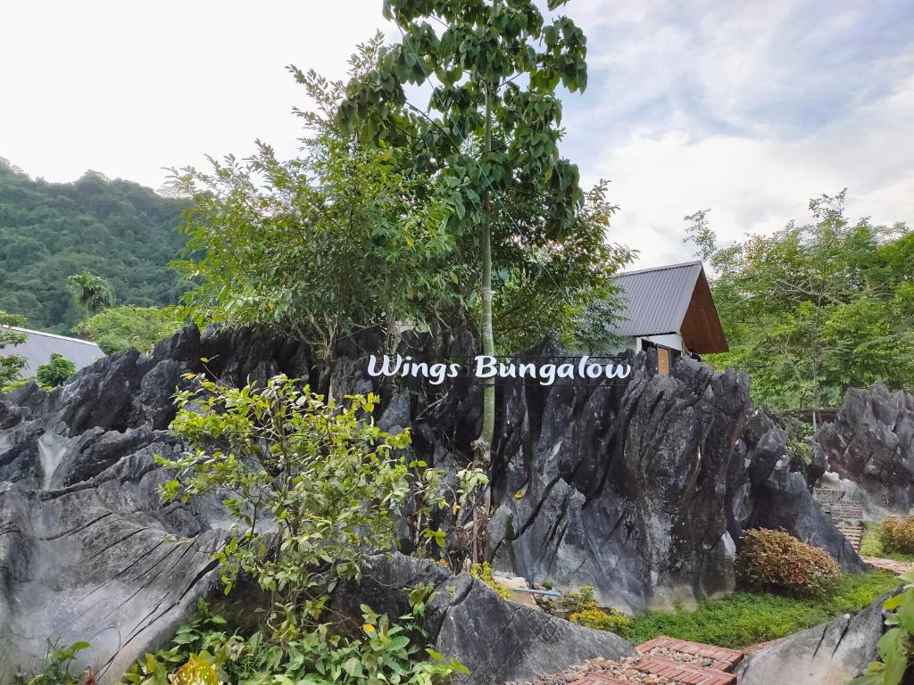 Двухместный (Двухместный номер Делюкс с 1 кроватью) отеля Ha Giang Wings Bungalow, Хазянг