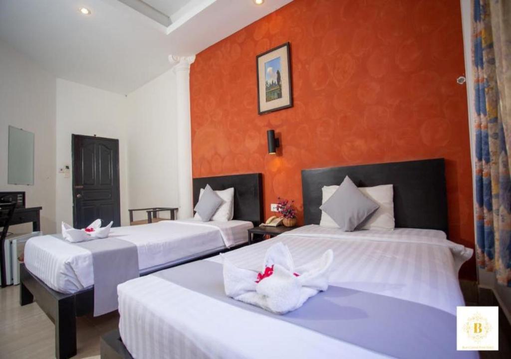 Двухместный (Улучшенный двухместный номер с 2 отдельными кроватями) отеля Best Central Point Hotel, Пномпень