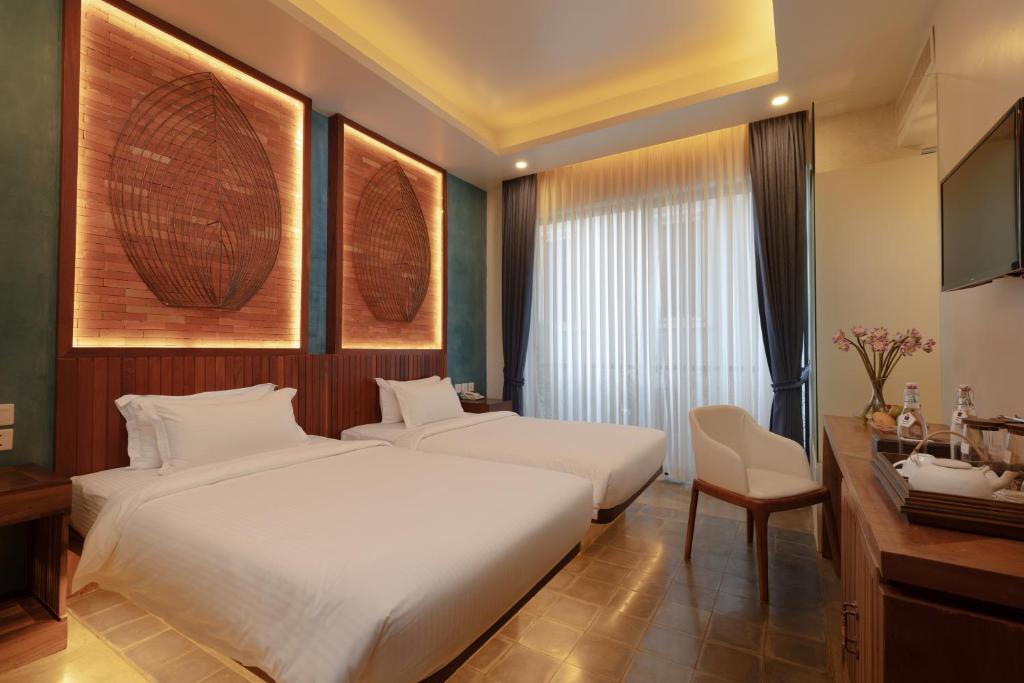 Двухместный (Special Offer 3 Rooms - Same Floor) отеля HARI Residence & Spa, Сием Рип