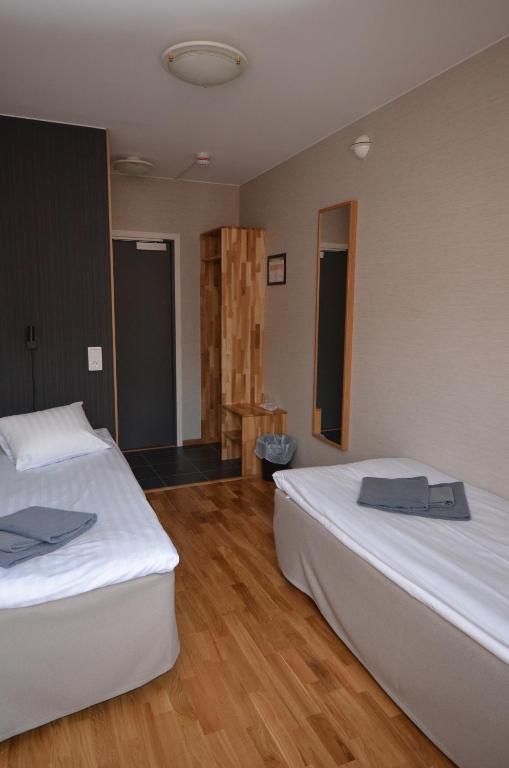 Двухместный (Стандартный двухместный номер с 2 отдельными кроватями) отеля Hotell Svanen, Кальмар