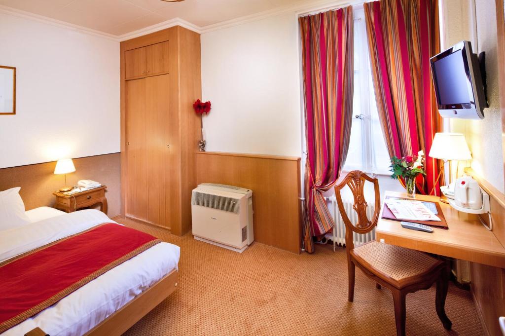 Двухместный (Двухместный номер с 1 кроватью или 2 отдельными кроватями) отеля Hotel AlaGare, Лозанна