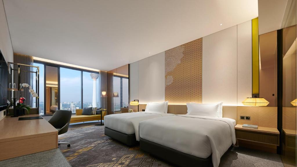 Двухместный (Клубный двухместный номер Делюкс с 2 отдельными кроватями) отеля EQ Kuala Lumpur, Куала-Лумпур