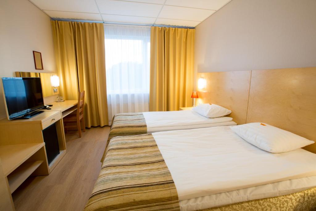 Двухместный (Двухместный номер с 1 кроватью или 2 отдельными кроватями, эксклюзивное право посещения спа-салона 18+) отеля Tallinn Viimsi Spa & Waterpark, Таллин