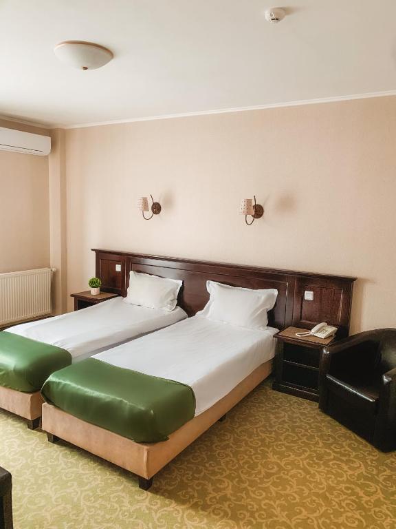 Двухместный (Классический двухместный номер с 2 отдельными кроватями) гостевого дома Curtea Bizantina, Сучава