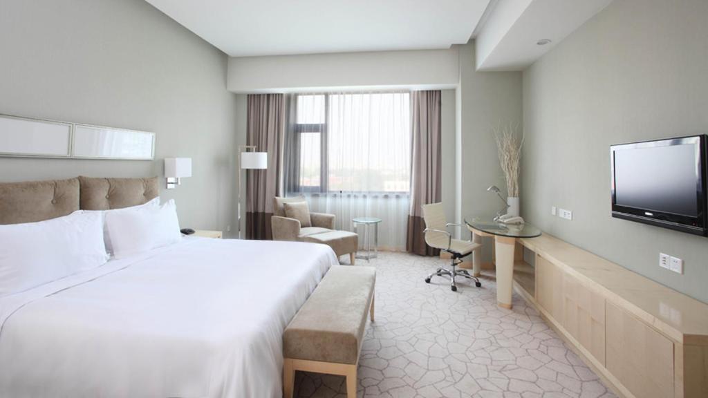 Двухместный (Улучшенный двухместный номер с 1 кроватью или 2 отдельными кроватями) отеля Holiday Inn Beijing Deshengmen, Пекин