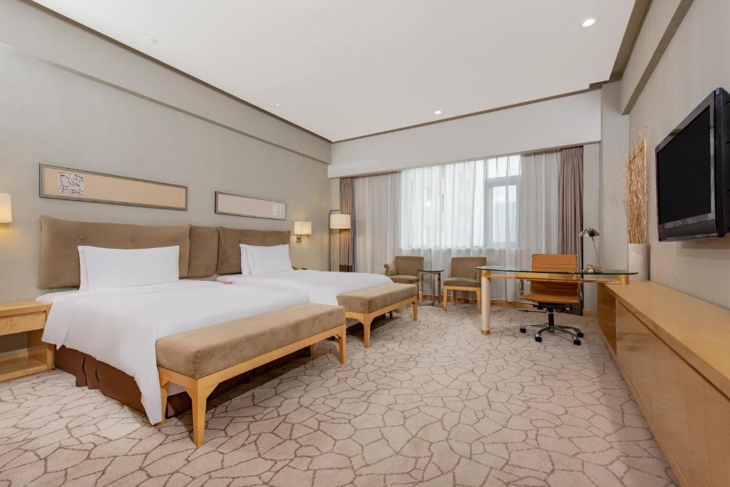 Двухместный (Двухместный номер Делюкс с 2 отдельными кроватями) отеля Holiday Inn Beijing Deshengmen, Пекин