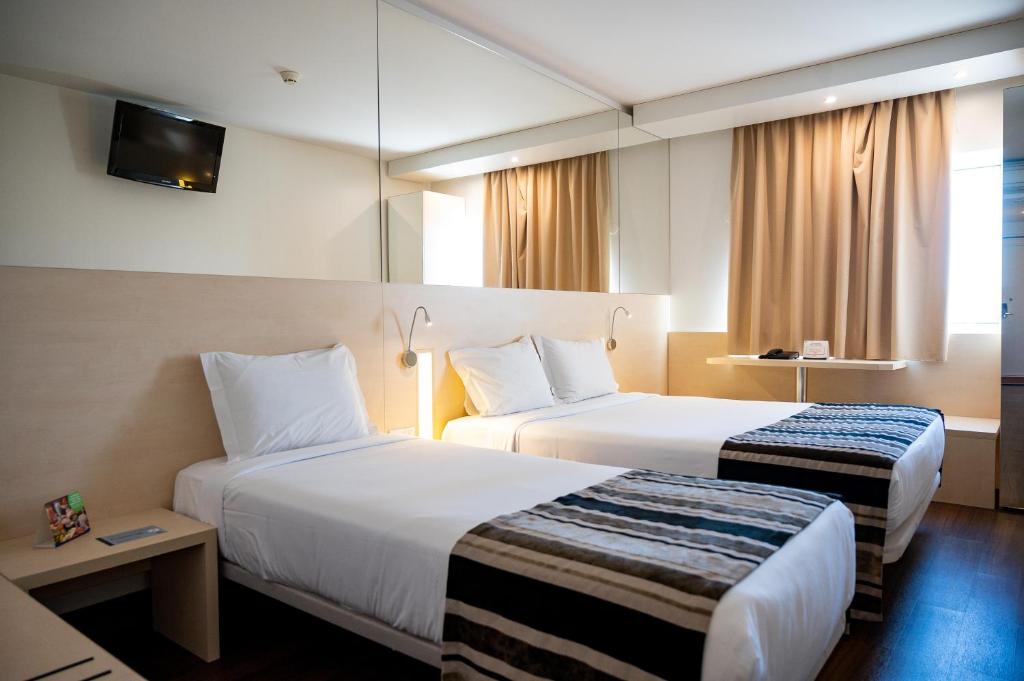 Двухместный (Двухместный номер с двуспальной кроватью и дополнительной кроватью) отеля Park Hotel Porto Aeroporto, Майя