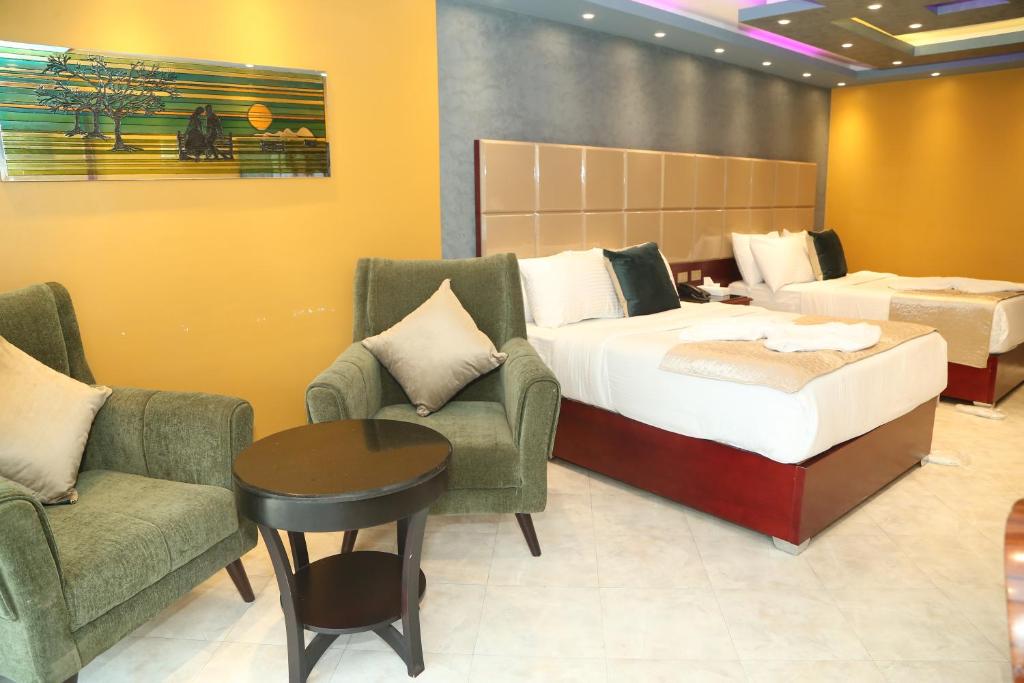 Двухместный (Улучшенный двухместный номер с 1 кроватью или 2 отдельными кроватями и видом на сад) отеля Grand Nile Royal Hotel at Nile Plaza, Каир