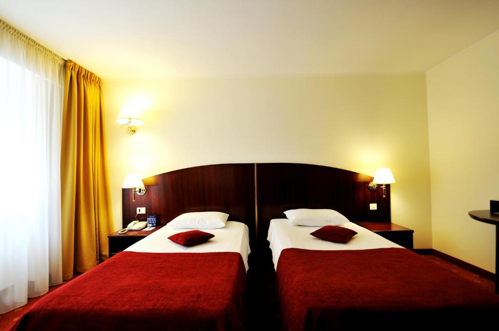 Двухместный (Двухместный номер с 2 отдельными кроватями) отеля Hotel Minerva, Бухарест