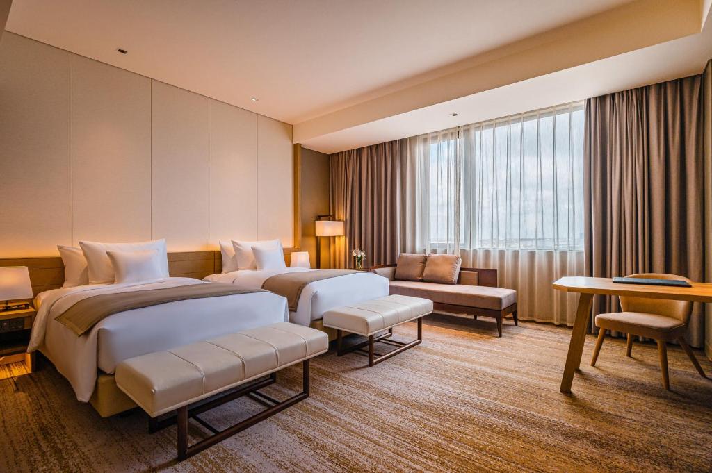 Двухместный (Клубный двухместный номер с 2 отдельными кроватями) отеля Hotel Nikko Hai Phong, Хайфон