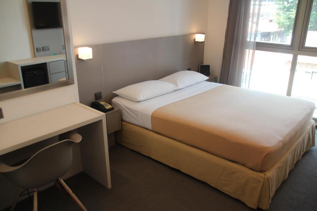 Двухместный (Улучшенный двухместный номер с 1 кроватью) отеля Classique Hotel, Сингапур (город)