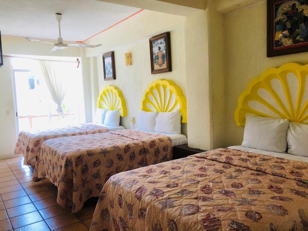 Трехместный (Стандартный трехместный номер) отеля Hotel Playa Santa Cruz, Санта-Крус-Хуатулко