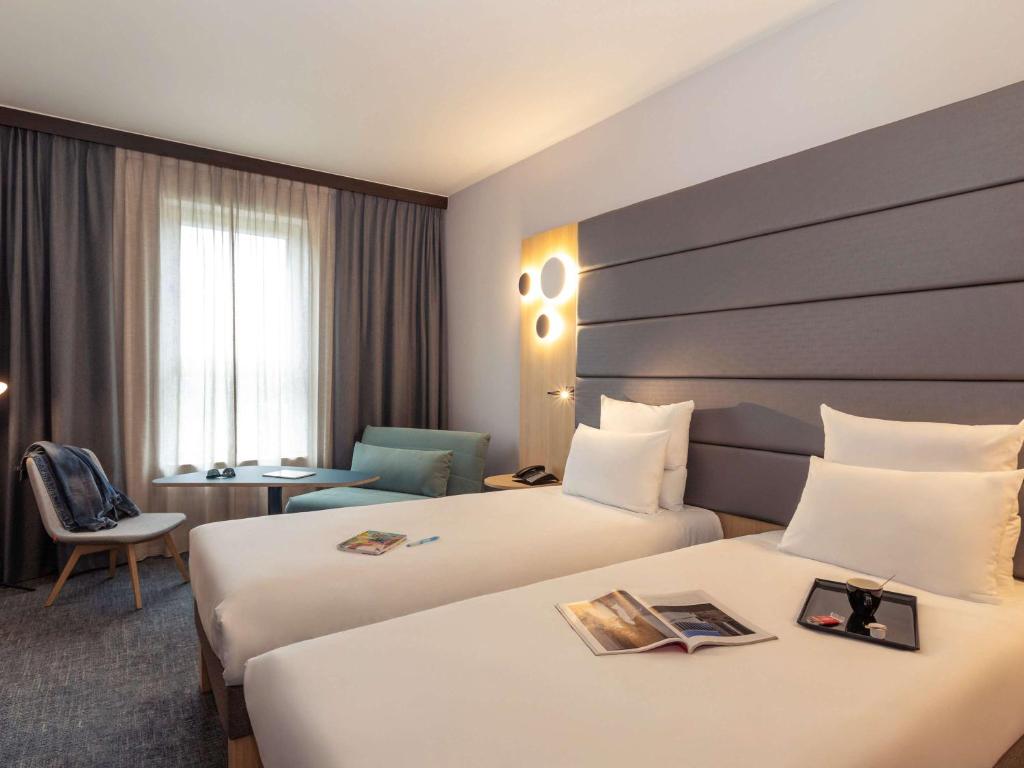 Двухместный (Улучшенный номер с 2 односпальными кроватями) отеля Novotel Brussels Centre Midi, Брюссель