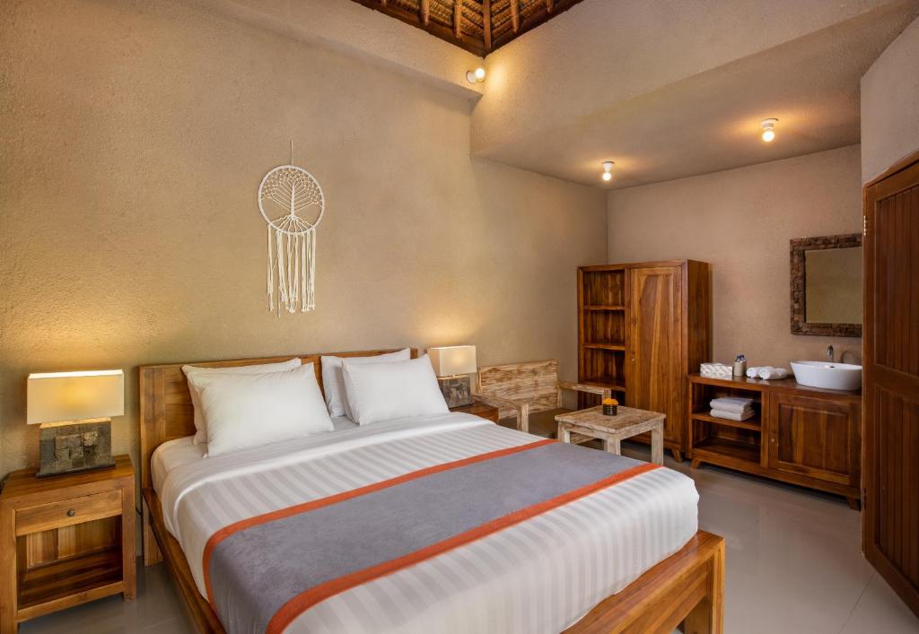 Двухместный (Двухместный номер Делюкс с 1 кроватью или 2 отдельными кроватями) парк-отеля Nusa Majesty Bungalow, Нуса Пенида