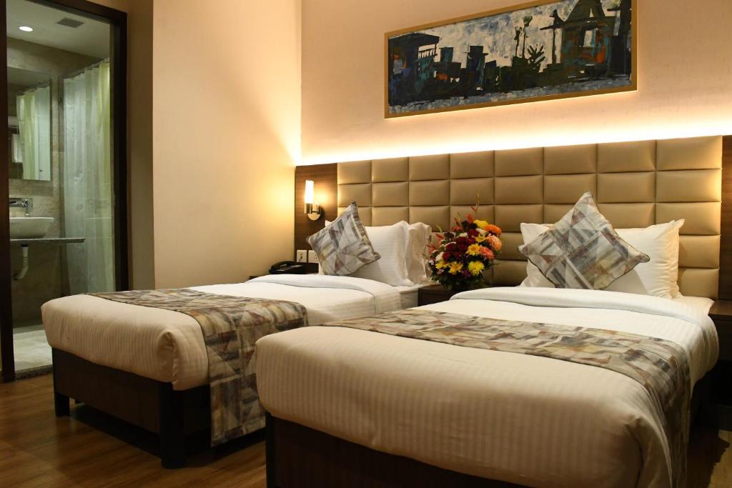 Двухместный (Двухместный номер Делюкс с 1 кроватью) отеля LYNQ AERO, Калькутта