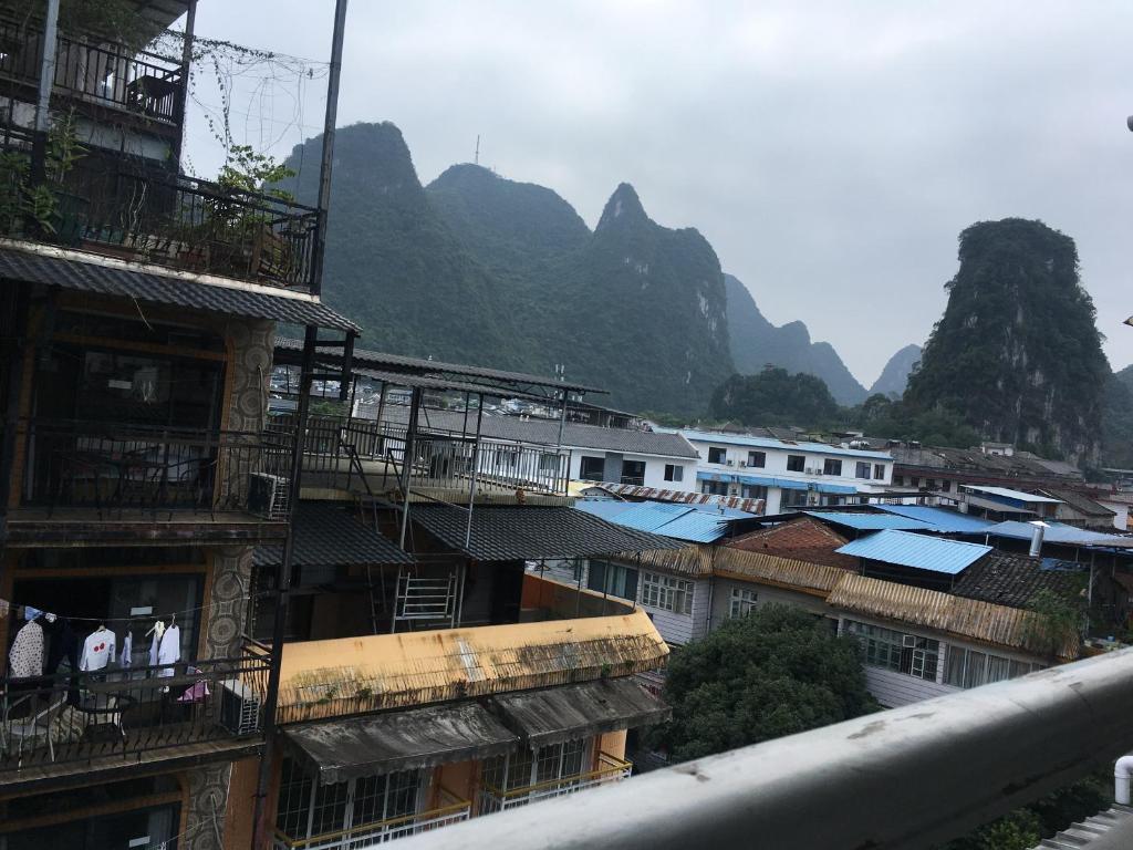 Семейный (Семейный люкс с балконом), Climbers Inn Yangshuo West Street