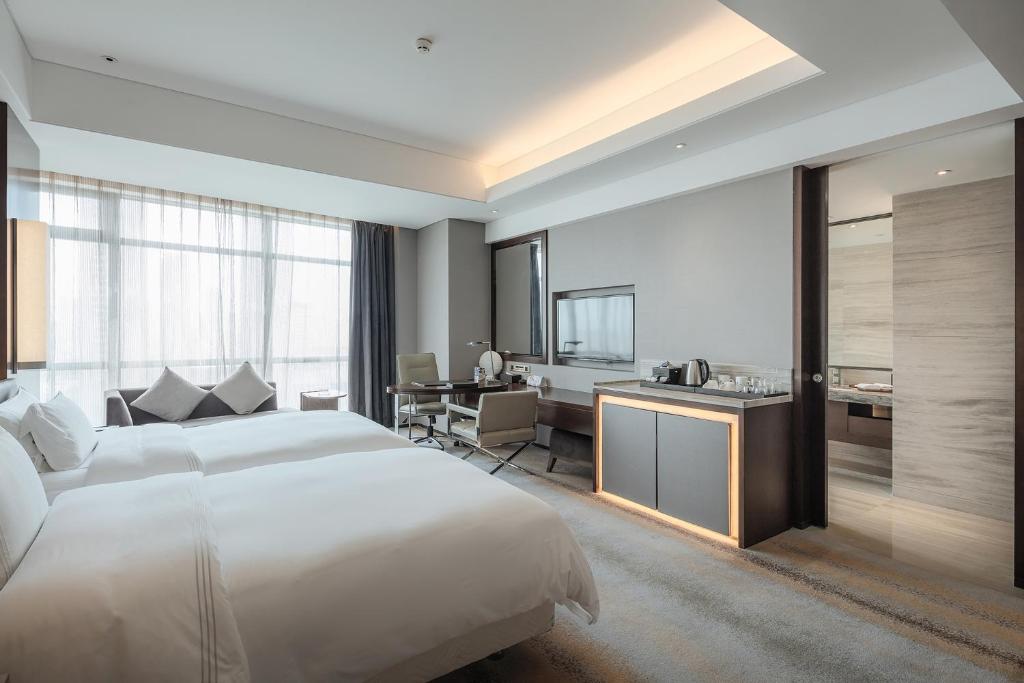 Двухместный (Двухместный номер Делюкс с 2 отдельными кроватями) отеля Hotel Nikko Suzhou, Сучжоу