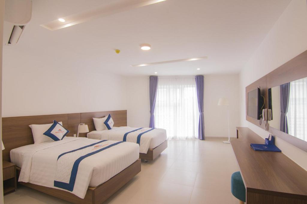 Двухместный (Улучшенный двухместный номер с 1 кроватью или 2 отдельными кроватями) отеля Mermaid Seaside Hotel, Вунгтау
