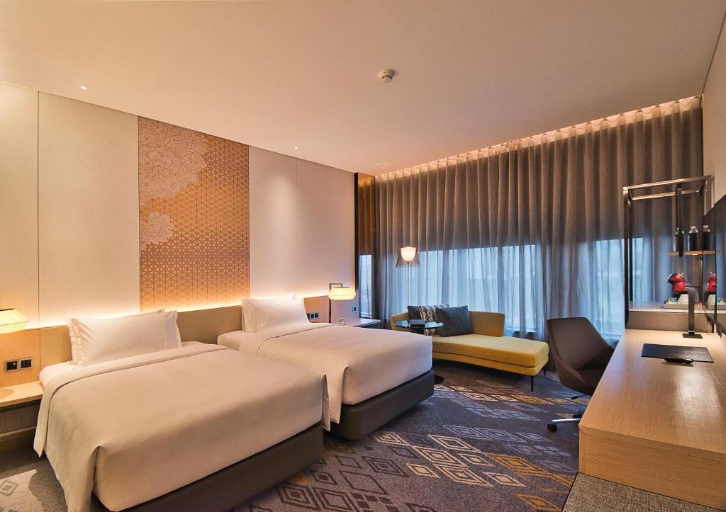 Двухместный (Двухместный номер Делюкс с 2 отдельными кроватями) отеля EQ Kuala Lumpur, Куала-Лумпур