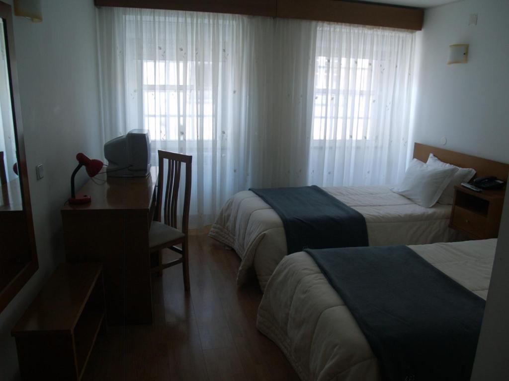 Двухместный (Двухместный номер с 2 отдельными кроватями) отеля Hotel Santos, Гуарда